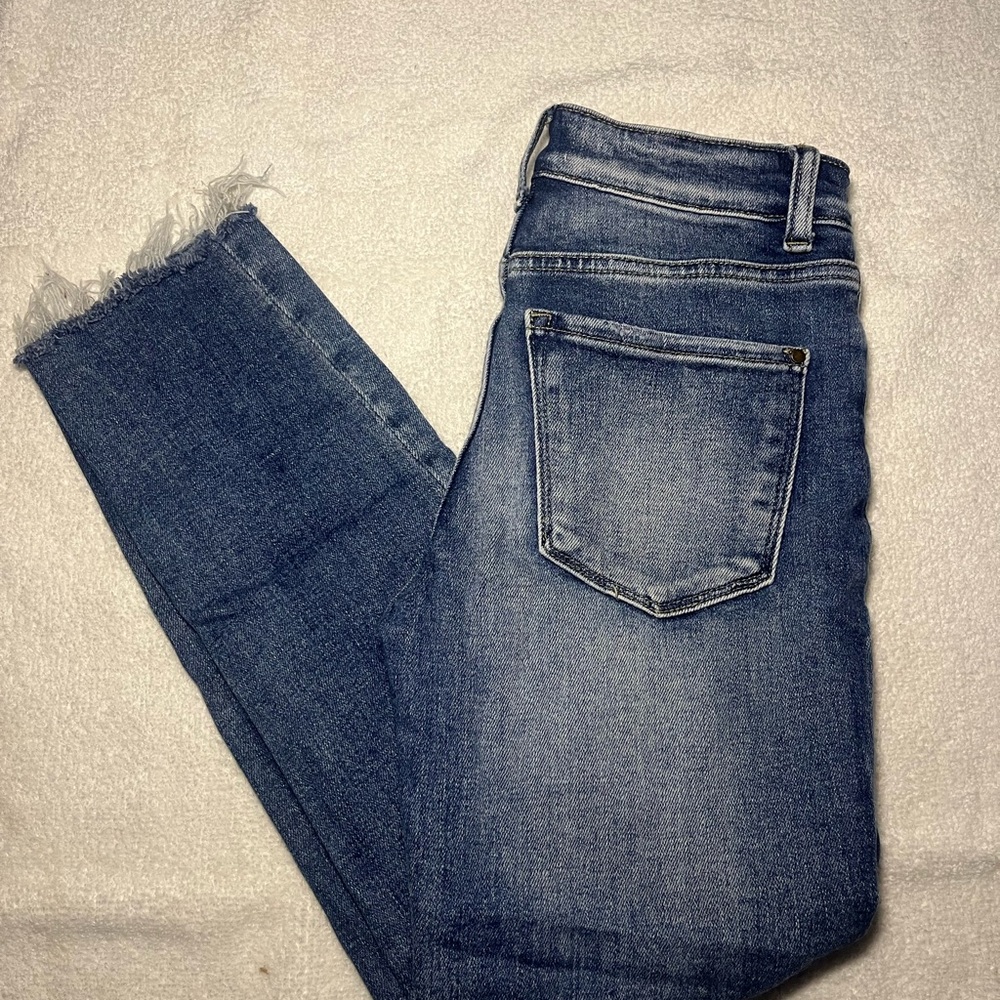 Distressed Denim Jeans